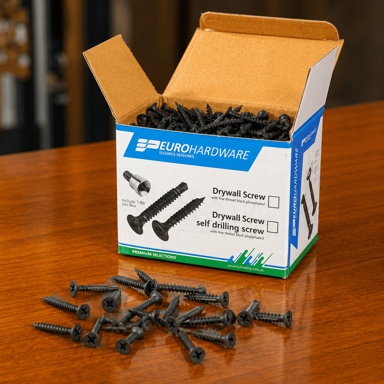 Open box of Euro Hardware black drywall screws with loose screws displayed on a wooden table